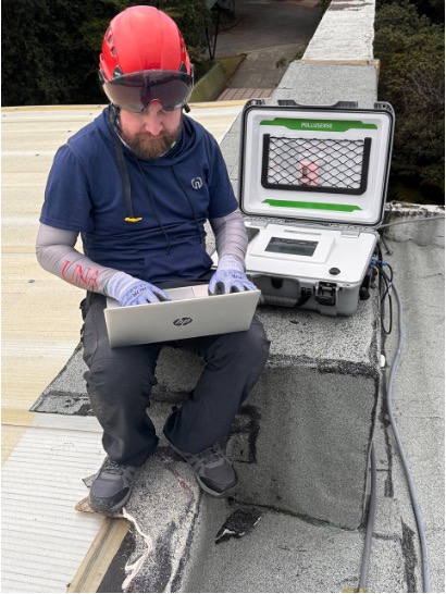Brenes setting up the long-term aerosol sensor at the park headquarters. Photo: Yemerith Alpízar